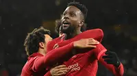 Divock Origi. Striker Belgia berusia 26 tahun yang telah 7 musim berseragam Liverpool ini tampil 4 kali di Carabao Cup musim 2021/2022 dan mampu menyumbang 3 gol dan 2 assist. Tampil 23 menit di laga final, eksekusi penaltinya berperan membawa kemenangan untuk The Reds. (AFP/Justin Tallis)