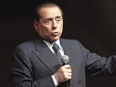 Italian Prime Minister Silvio Berlusconi delivers a speech during the "Festa della Liberta" (The freedom festival) organised by his party "Il popolo della Liberta" (the people of freedom) on October 5, 2008, in Milan. AFP PHOTO/Emilio 