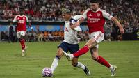 Duel antara Arsenal vs Tottenham pada laga pramusim di&nbsp;Kai Tak Sports Park, Kamis (31/7) malam WIB -&nbsp;ASSOCIATED PRESS/Chan Long Hei