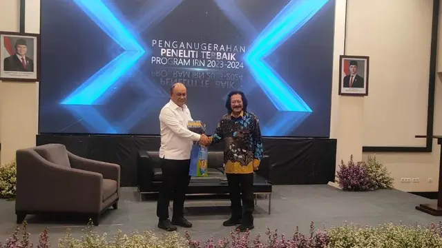 Simposium Pangan Nasional bertema “Program Makan Bergizi Gratis sebagai MotorPenggerak Transformasi Sistem Pangan Tangguh Berbasis Potensi Pangan Fungsional dan Kearifan LokalNasional”. (Liputan6.com/Henry)