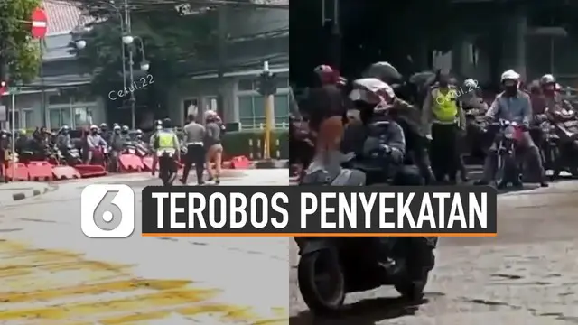 Beredar video rombongan pengendara motor nekat menjebol dan menerobos penyekatan jalur di ruas simpang Jalan Aceh - Merdeka, Bandung.