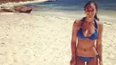 Michelle Jenneke dikenal dengan pemanasan seksi yang kerap dilakukannya sebelum berlari. (Bola.com/Instagram/Michelle Jenneke)