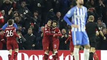 Striker Liverpool, Roberto Firmino, merayakan golnya ke gawang Brighton & Hove Albion,  pada laga lanjutan Premier League, di Stadion AMEX, Sabtu (2/12/2017).  (AP/Gareth  Fuller).
