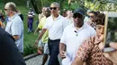 Mantan Presiden Amerika Serikat Barack Obama bersama keluarga dan rombongannya mengunjungi Pura Tirta Empul, Tampaksiring, Gianyar, Bali, Selasa (27/6). (Liputan6.com/Immanuel Antonius)