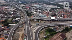 Foto udara Jalan Tol Layang Dalam Kota Kelapa Gading - Pulo Gebang, Jakarta, Sabtu (20/11/2021). Jalan Tol Layang Dalam Kota Kelapa Gading - Pulo Gebang memiliki enam ruas jalan dengan panjang 9,3 kilometer. (merdeka.com/Imam Buhori)