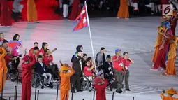 Atlet Para Games dari berbagai negara melakukan defile saat pembukaan Asian Para Games 2018 di Stadion Utama Gelora Bung Karno, Jakarta, Sabtu (6/10).  Ribuan atlet dari 41 negara akan berlaga. (Liputan6.com/Helmi Fithriansyah)