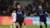 Bek Inter Milan, Danilo D'Ambrosio merayakan gol ke gawang Fiorentina dalam laga lanjutan Serie A 2018-2019 di Giuseppe Meazza, Rabu (26/9/2018) dini hari WIB. (AP Photo/Luca Bruno)