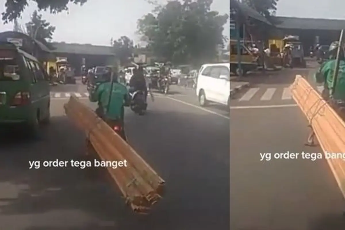 Driver ojol angkut balok kayu