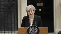 Theresa May saat konferensi pers terkait ledakan Manchester Arena (AP)
