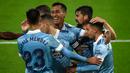Pemain Celta Vigo merayakan gol yang dicetak Fran Beltran ke gawang Cadiz pada laga lanjutan Liga Spanyol di Stadion Abanca Balaidos, Selasa (15/12/2020) dini hari WIB. Celta Vigo menang telak 4-0 atas Cadiz. (AFP/Miguel Riopa)
