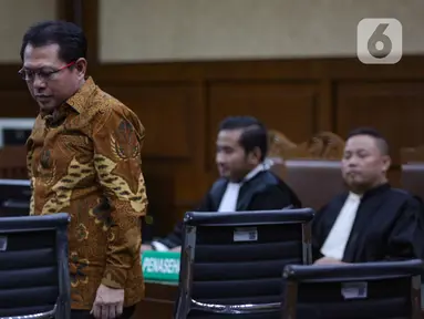 Terdakwa kasus dugaan suap dan gratifikasi pengurusan perkara di Mahkamah Agung (MA) Hasbi Hasan usai menjalani sidang pembacaan putusan di Pengadilan Tipikor, Jakarta, Rabu (3/4/2024). (merdeka.com/Arie Basuki)