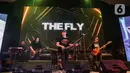 Grup musik The Fly saat tampil pada hari kedua festival musik All You Can Hear Gigs di Asthana Kemang, Jakarta Selatan, Rabu (6/11/2024). (Liputan6.com/Angga Yuniar)