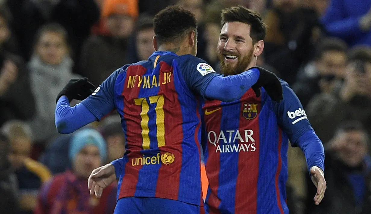 Bintang Barcelona, Lionel Messi, merayakan gol yang dicetaknya ke gawang Athletic Bilbao. Barcelona akhirnya menang 3-1 dan berhasil lolos ke babak perempat final Copa del Rey. (AFP/Lluis Gene)