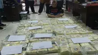 Nurhasan (46) pelaku pembawa narkoba seberat 115 kilogram dari Pekanbaru menuju Palembang. Dia diamankan oleh Badan Narkotika Nasional Provinsi (BNNP) Sumsel, Selasa (25/1/2023). (ISTIMEWA)