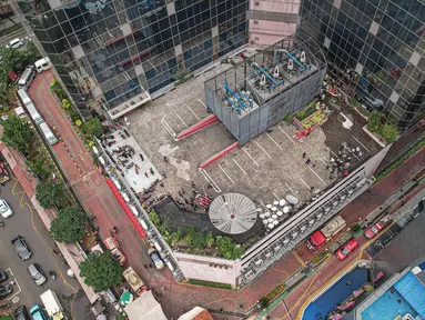 Suasana Gedung Kementerian Hukum dan Hak Asasi Manusia Republik Indonesia (Kemenkumham) seusai peristiwa kebakaran di Jalan Rasuna Said, Kuningan Jaksel, Kamis (8/12/2022). Penyebab kebakaran sebuah ruangan di lantai 5 Gedung Kemenkumham diduga akibat hubungan arus pendek listrik. (Liputan6.com/Faizal Fanani)