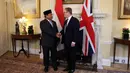 Kedua negara sepakat untuk memperkuat dan merevitalisasi hubungan melalui Kemitraan Strategis yang baru dan lebih dalam di tahun-tahun mendatang. (Mina Kim/POOL/AFP)