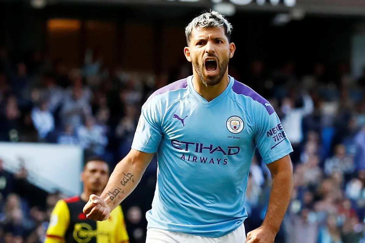 Striker Manchester City, Sergio Aguero merayakan golnya ke gawang Watford