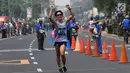 Atlet Korea Selatan, Hyunmyeong Joo melakukan selebrasi usai menempati posisi ketiga cabang jalan cepat 50 Km putra di Asian Games 2018, Jakarta, Kamis (30/8). Hyunmyeong Joo menorehkan waktu 4 jam 6 menit dan 48 detik. (Merdeka.com/Imam Buhori)