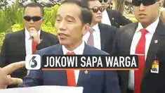 Presiden Jokowi turun dari mobil demi menyapa warga yang memenuhi kawasan Monas. Ini dilakukan Jokowi saat perjalanan menuju Gedung MPR, Jakarta, Minggu (20/10/19).