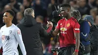 Manajer Manchester United, Ole Gunnar Solskjaer, menganggap Paul Pogba layak menjadi kapten The Red Devils. (AFP/Paul Ellis)