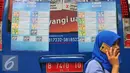 Poster yang menjelaskan pecahan mata uang yang baru di Blok M, Jakarta, Senin (19/12). Uang rupiah kertas baru terdiri atas nilai nominal Rp 100 ribu, Rp 50 ribu, Rp 20 ribu, Rp 10 ribu, Rp 5.000, Rp 2.000, dan Rp 1.000. (Liputan6.com/Angga Yuniar)