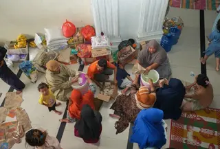 Banjir Langkat dan di sejumlah wilayah di Sumut menyebabkan warga mengungsi. (Antara)