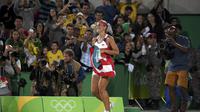Petenis Puerto Rico, Monica Puig, menjuarai cabang tenis putri Olimpiade Rio de Janeiro 2016. Sementara Rafael Nadal harus mengubur mimpinya ke final. (REUTERS/Toby Melville)