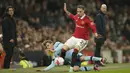 <p>Dalam laga ini, Manchester United menang tipis 1-0 atas Brentford. (AP Photo/Dave Thompson)</p>