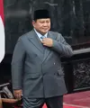 Presiden Prabowo Subianto saat menyampaikan pidato dalam Sidang Tahunan MPR RI dan Sidang Bersama DPR-DPD RI Tahun 2026 di Kompleks Parlemen, Jakarta, Jumat (14/8/2026). (AP/ Dita Alangkara)