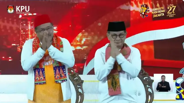 Paslon Pilkada Jakarta 2024 nomor urut 3 Pramono Anung-Rano Karno dalam debat perdana Pilkada Jakarta 2024, Minggu (6/10/2024) di JIExpo Kemayoran, Jakarta Pusat.