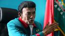 Ketua Umum Partai Idaman Rhoma Irama menjawab pertanyaan wartawan di Kantor DPP Partai Idaman, Jakarta, Selasa (16/1). Partai Idaman menyatakan akan melaporkan Bawaslu ke DKPP terkait dugaan pelanggaran kode etik. (Liputan6.com/JohanTallo)
