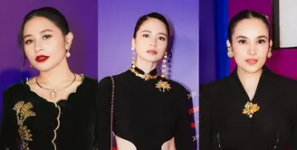 Laura Basuki kembali memukau publik dengan pesonanya di karpet merah FFI 2024. Laura Basuki mengenakan gaun cut out backless dress yang terinspirasi dari siluet kebaya janggan tradisional, sebuah karya apik yang dirancang dengan detail memukau oleh Kraton World.