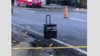 Penemuan koper hitam mencurigakan di sekitar Masjid Al-Markaz (Liputan6.com/Fauzan)