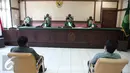 Kuasa hukum Gayus Tambunan, Junder Tambunan SH (kiri) dan Muallim Tappa SH selaku kuasa hukum istrinya Milana Anggraeni saat menjalani sidang perceraian di Pengadilan Agama Jakarta Utara, Rabu (30/9/2015). (Liputan6.com/Faizal Fanani)