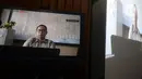 Terdakwa Tubagus Chaeri Wardana alias Wawan mendengarkan Jaksa Penutut Umum (JPU) membacakan tuntutan dalam sidang online di Gedung KPK, Jakarta, Senin (29/6/2020). Wawan terjerat tindak pidana pencucian uang (TPPU) dalam kasus sejumlah korupsi. (merdeka.com/Dwi Narwoko)