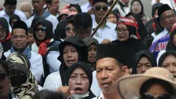 Dan tuntutan mereka masih sama yakni diterbitkan SK inpassing tahun 2023.  (merdeka.com/Imam Buhori)