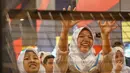 Sejumlah anak-anak menikmati permainan pada acara Ngabuburit Bareng Anak Yatim di Timezone Lippo Mall Kemang, Jakarta, Kamis (23/5/2019). Kegiatan yang bekerjasama dengan Baznas diharapkan dapat memberi keceriaan kepada anak-anak di bulan suci Ramadan. (Liputan6.com/Fery Pradolo)