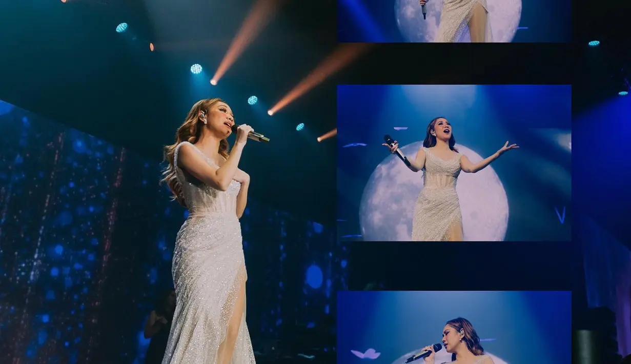 <p>Outfit selanjutnya di konser BLC Singapura bertajuk 'Blossom' adalah bustier dress yang dipenuhi taburan payet silver yang glamor. BCL benar-benar tampil bersinar dan blossom. (Foto: Instagram @teambcl Fotografer: @davianakbar)</p>