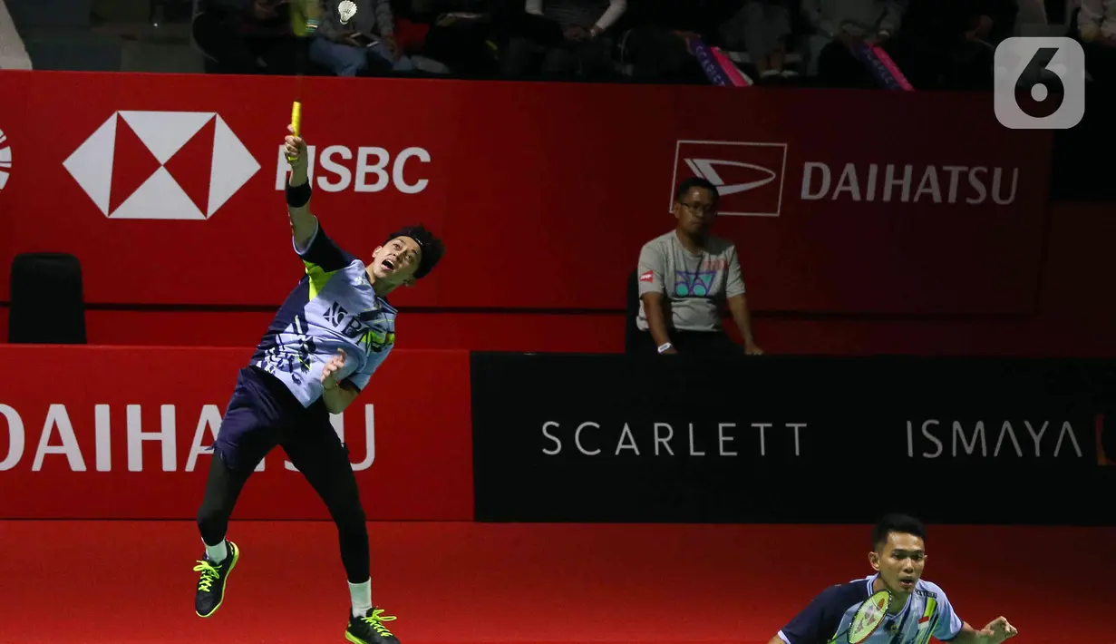 <p>Pebulu tangkis ganda putra Indonesia Fajar Alfian/Muhammad Rian Ardianto saat bertanding melawan pemain pebulu tangkis ganda putra Indonesia Pramudya Kusumawardana/Yeremia Rambitan pada babak 32 besar turnamen Daihatsu Indonesia Masters 2023 di Istora Senayan, Jakarta, Selasa (24/1/2023). Fajar Alfian/Muhammad Rian Ardianto menang atas Pramudya Kusumawardana/Yeremia Rambitan dengan skor 18-21, 21-14, dan 21-10. (Liputan6.com/Herman Zakharia)</p>