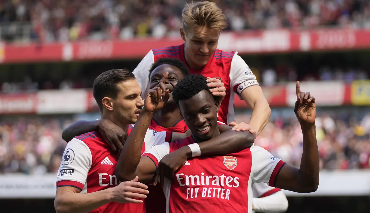 <p>Arsenal berhasil mengemas 4 kemenangan beruntun di Liga Inggris usai mengalahkan tamunya Leeds United 2-1 dalam laga lanjutan Liga Inggris pekan ke-36, Minggu (8/5/2022) malam WIB. Dua gol kemenangan The Gunners dicetak oleh striker muda mereka, Eddie Nketiah. (AP/Frank Augstein)</p>