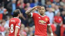 Penyerang Manchester United, Memphis Depay, bahagia dengan gol pertamanya di Premier League dalam laga kontra Watford, Sabtu (21/11/2015) malam WIB. (EPA/Peter Powell)
