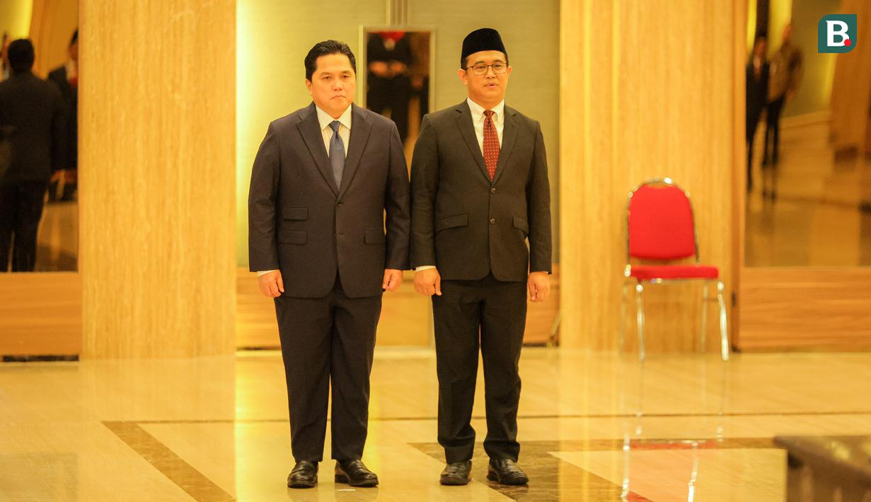 <p>Ketua Umum PSSI, Erick Thohir (kiri) menghadiri pengambilan sumpah kewarganegaraan Republik Indonesia Miliano Jonathans di Kementerian Hukum dan HAM, Kuningan, Jakarta Selatan, Rabu (03/09/2025). (Bola.com/Bagaskara Lazuardi)</p>