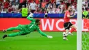 Bertemu Polandia, Austria menang telak dengan skor 3-1. (JOHN MACDOUGALL/AFP)