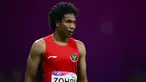 Pelari asal Indonesia, Lalu Muhammad Zohri bereaksi usai berlaga pada final 100m putra Asian Games 2023 di Hangzhou, Provinsi Zhejiang, China, Sabtu (30/9/2023). (Manan VATSYAYANA/AFP)