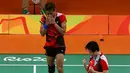 Ekspresi Tontowi Ahmad/Liliyana Natsir usai mengalahkan Praveen Jordan/Debby Susanto di perempat final Bulutangkis Olimpiade Rio 2016, Senin (15/8). Kemenangan ini mengantarkan Tontowi Ahmad/Liliyana Natsir  ke semifinal. (REUTERS)
