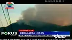 Kepulan asap tebal ini muncul, dari lereng Gunung Arjuno di Taman Hutan Raya Raden Soerjo atau Tahura R. Soerjo Kecamatan Prigen, Pasuruan, Jawa Timur, Jum’at (11/10) sore.