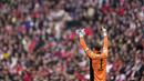 <p>Ini adalah momen juara yang tepat bagi Bayern. Mereka juara di depan pendukung sendiri dan mengalahkan sang rival abadi. (AP Photo/Matthias Schrader)</p>