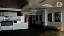 Suasana Cinema XXI di salah satu pusat perbelanjaan kawasan Jakarta Timur ditutup sementara, Senin (23/3/2020). Guna mencegah penyebaran Covid-19, bioskop Cinema XXI di DKI Jakarta dan beberapa kota di Indonesia ditutup sementara mulai hari ini hingga 5 April 2020. (merdeka.com/Iqbal S. Nugroho)