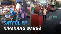Suasana panas kembali terjadi saat Satpol PP hendak menertibkan pedagang