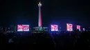 Suasana nonton bareng pertandingan perebutan juara ketiga Piala Asia U-23 2024 antara Timnas Indonesia U-23 melawan Irak U-23 di Kompleks Monumen Nasional (Monas), Jakarta, Kamis (03/05/2024). (Bola.com/Bagaskara Lazuardi)
